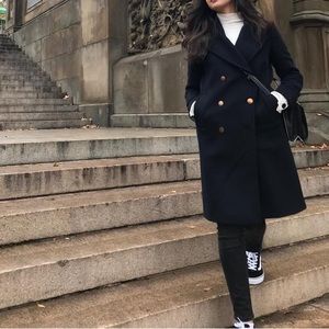 Oversized long coat in navy blue with gold buttons